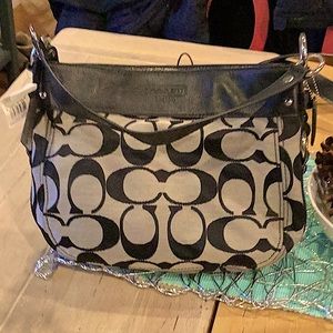 Brand new tags still on it. Coach bag black/dark gray.